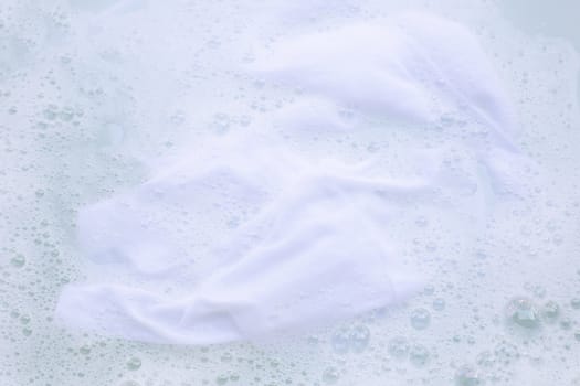 Soak a cloth before washing, white cloth