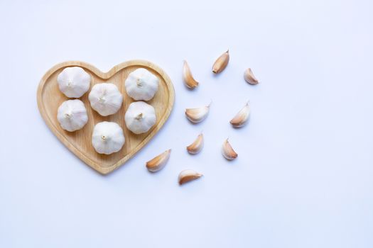 Garlic on white background. Copy space