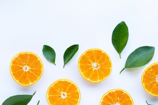 High vitamin C, Orange fruits with leaves on white background. Coppy space