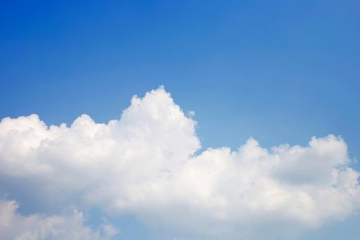 Blue sky background with cloud. Copy space