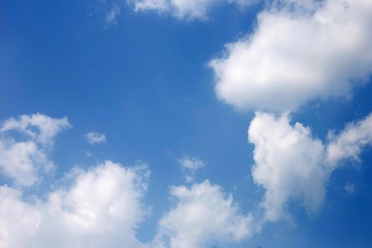 Blue sky background with cloud. Copy space