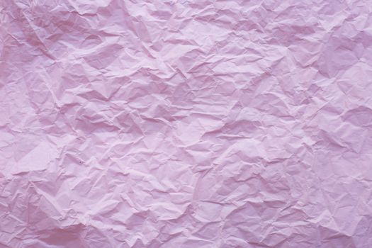 Pink crumpled recycle paper background
