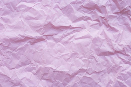Pink crumpled recycle paper background