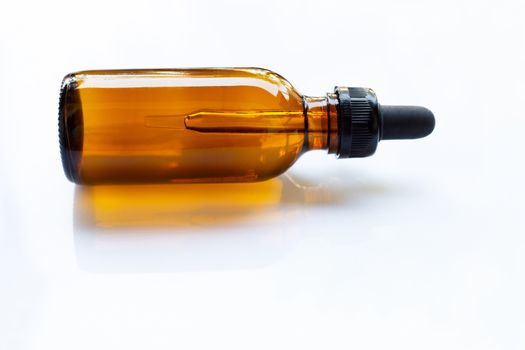 Brown Bottle Eye Dropper on white background