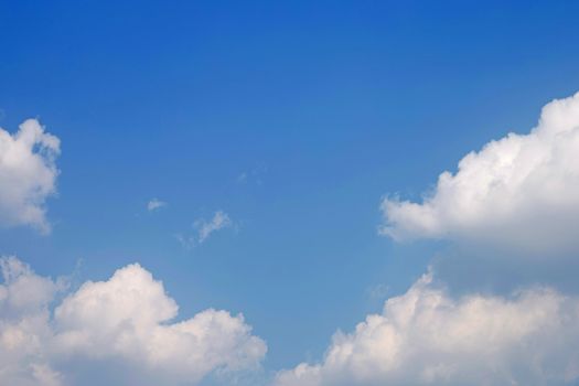 Blue sky background with cloud. Copy space