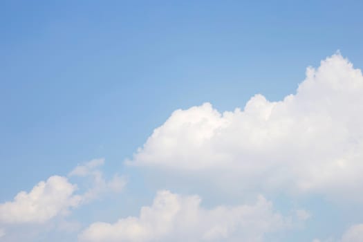 Blue sky background with cloud. Copy space