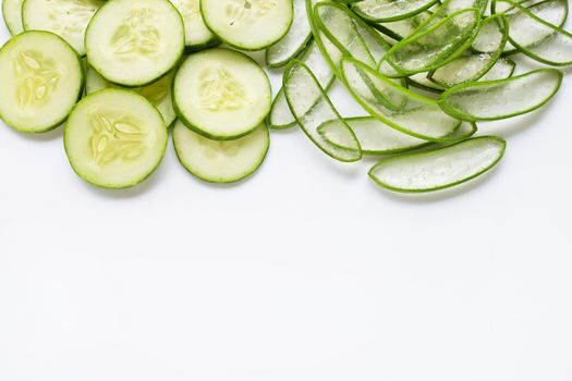 Aloe vera and cucumbers isolated on white background