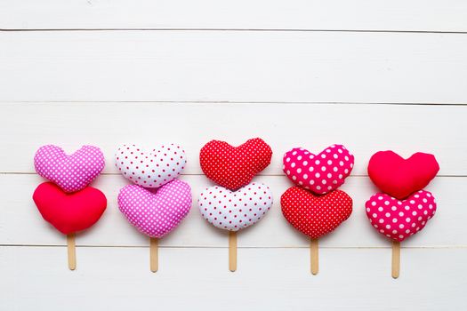 Valentine's hearts on white wooden background. Copy space