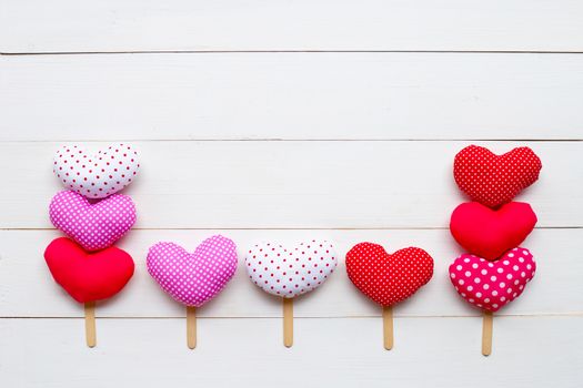 Valentine's hearts on white wooden background. Copy space