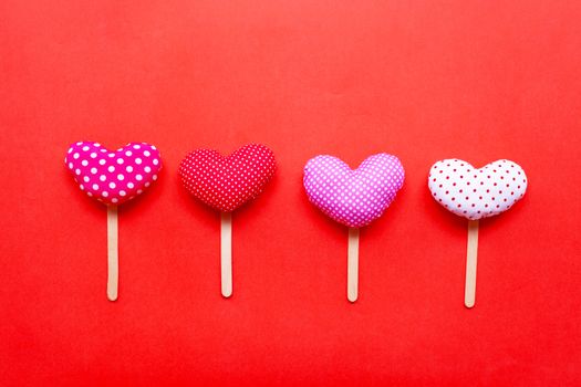 Valentine's hearts on  red paper background