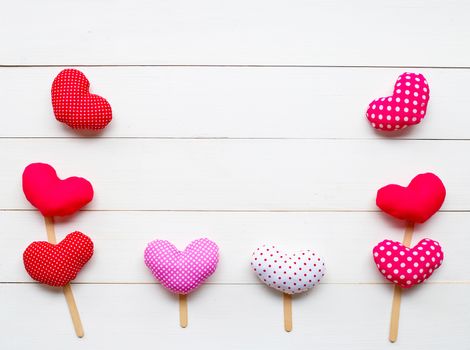 Valentine's hearts on white wooden background. Copy space