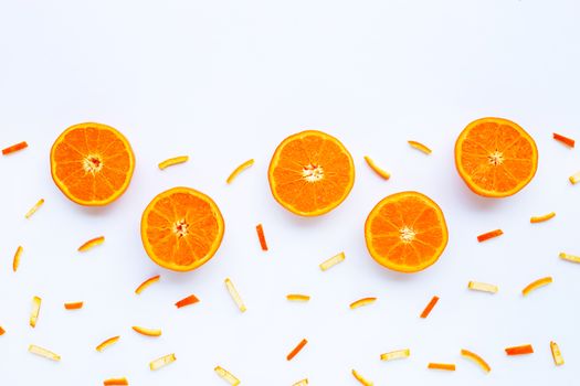 Orange with peels on white background.