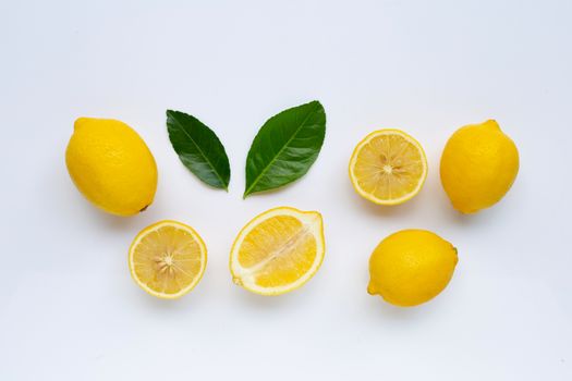 lemon and slices with leaves isolated on white background.