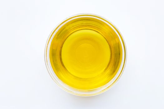 Olive oil bowl isolated on white. Top view