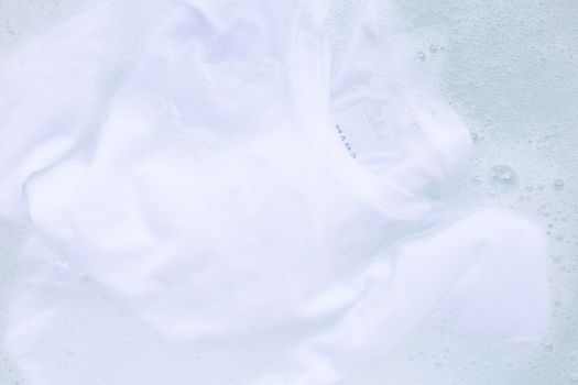 Soak a cloth before washing, white T-shirt