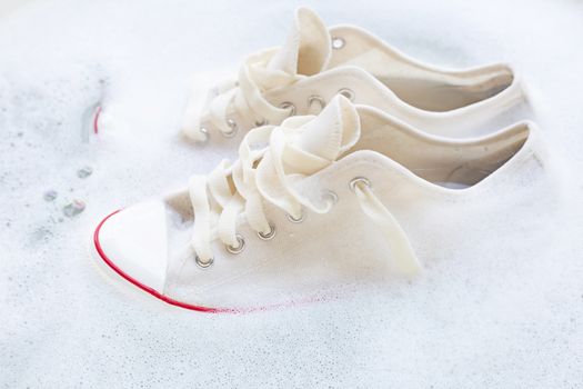 Soak shoes before washing. Cleaning Dirty sneakers.