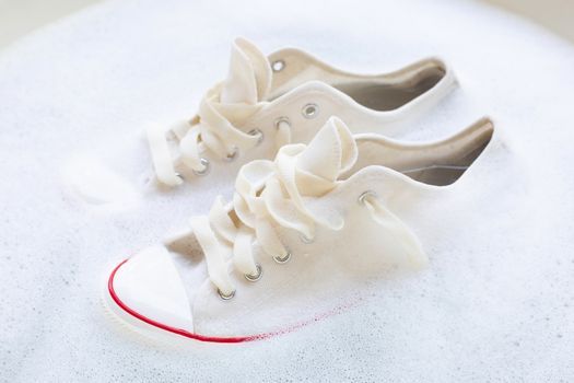 Soak shoes before washing. Cleaning Dirty sneakers.