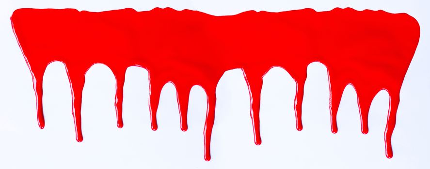 Red paint dripping on a white background