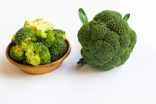 Fresh green broccoli on white background.