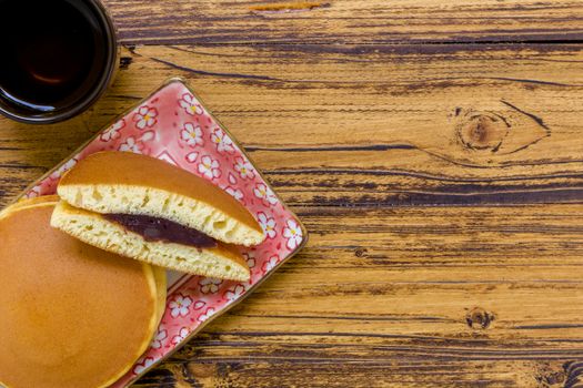 Dorayaki or Japanese pancake filled with red bean paste.