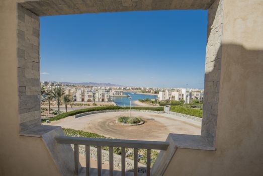 View from balcony of luxury villa in tropical resort with sea view