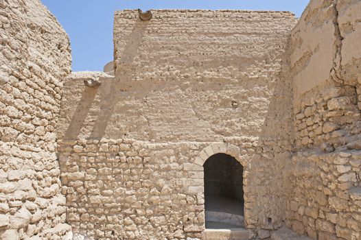 Ancient old walls and doorway entrance in ottoman period fort at El Quseir Egypt