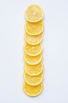 Fresh lemon slices on white background.