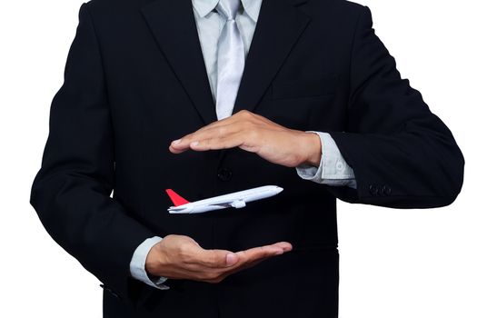 airplane flight in hand of businessman, isolated on white background with clipping path. business of travel and transportation industry