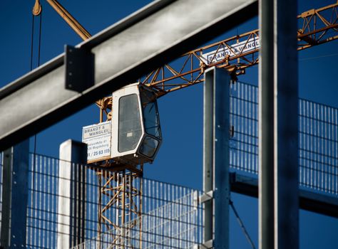 Gifhorn, Lower Saxony, Germany, December 29, 2017: Zoom view of the cab of a construction crane on a construction site