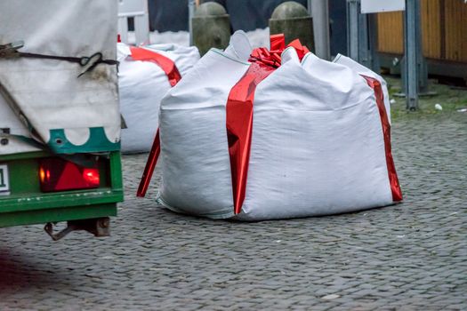 Gifhorn, Lower Saxony, Germany, December 2,2017: Edge of the Christmas Market with Barriers camouflaged as gifts to protect against terrorist attacks with trucks