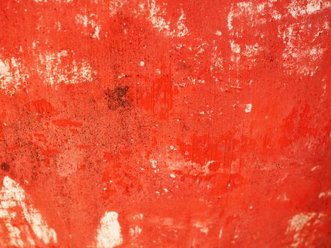 Old cement plastered in red.