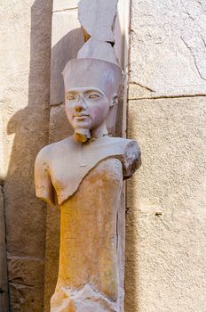 Karnak temple in Luxor, Egypt. Statue of Amun Ra