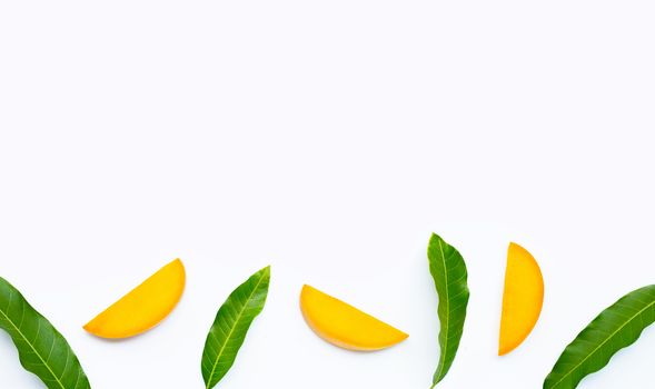 Tropical fruit, Mango slices on white background. Copy space