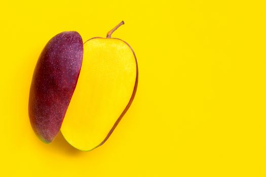 Tropical fruit, Mango on yellow background. Copy space