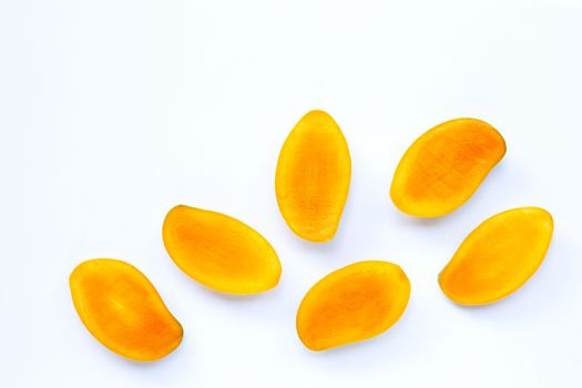 Tropical fruit, Mango slices on white background. Copy space