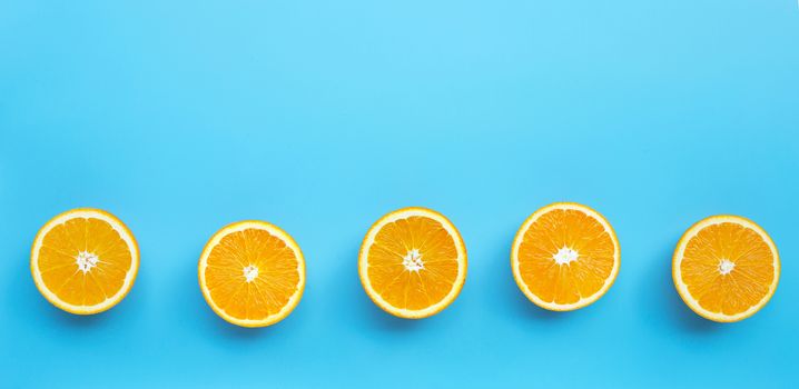 High vitamin C, Juicy and sweet. Fresh orange fruit  on blue background. Top view