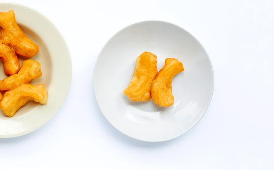 Deep-fried dough stick, chinese bread stick on white background.