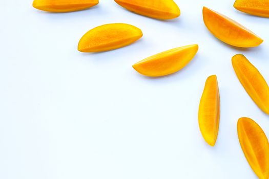 Tropical fruit, Mango  slices on white background. copy space