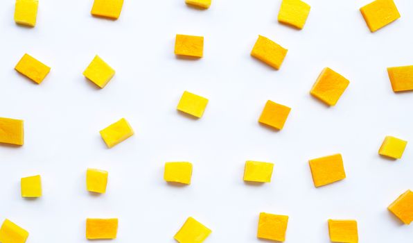 Tropical fruit, Mango cube slices on white background. Top view