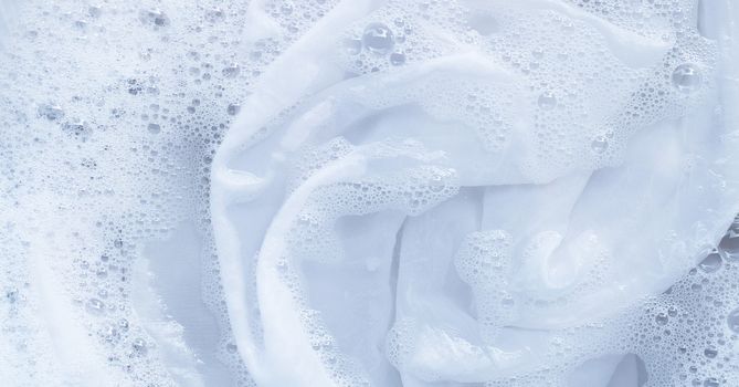 Top view of soak a cloth before washing, white cloth