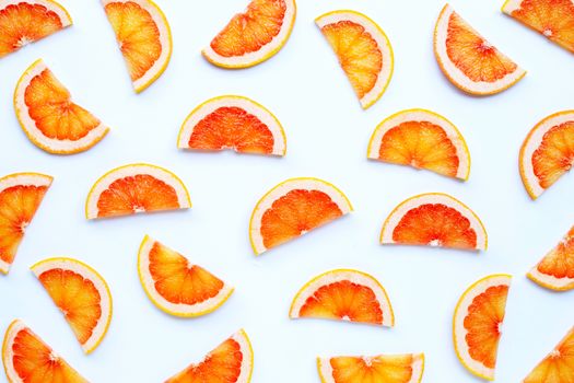 High vitamin C. Juicy grapefruit slices on white background. Top view