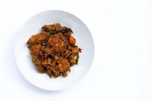 Thai spicy food, Stir fried catfish on dish on white background. Copy space