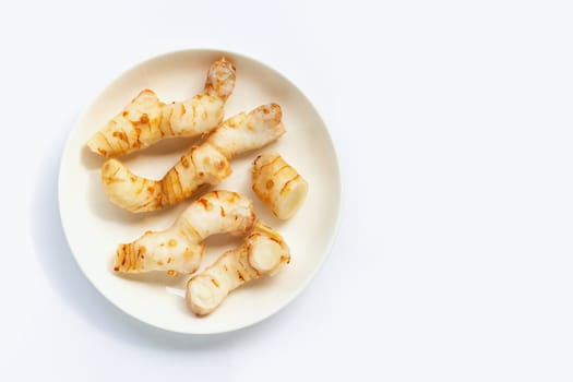 Fresh galangal isolated on white background.