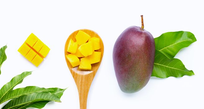 Mango, Tropical fruit with leaves on white background. Top view