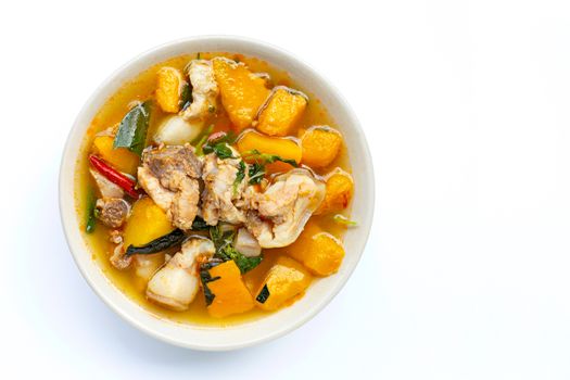 Pumpkin curry with pork on white background. Thai food