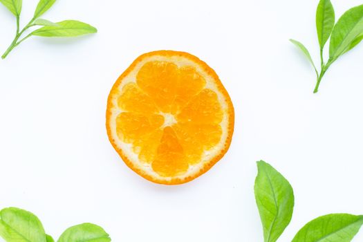 Fresh orange citrus fruit with leaves on white background. Juicy, sweet and high vitamin C. Top view
