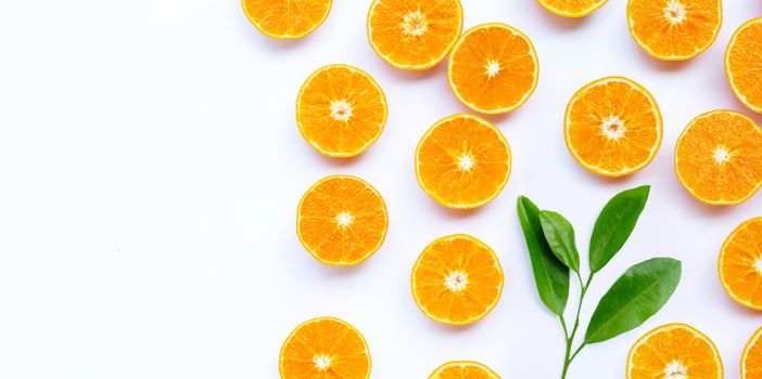 Orange fruit with leaves on white background. Copy space