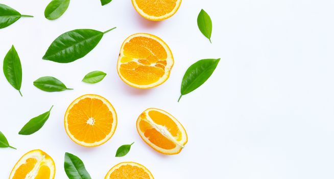Oranges with leaves on white background. Copy space