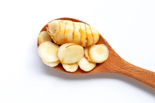 Fresh galangal isolated on white background.
