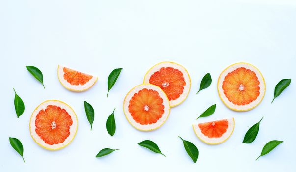 High vitamin C. Juicy grapefruit slices on white background.